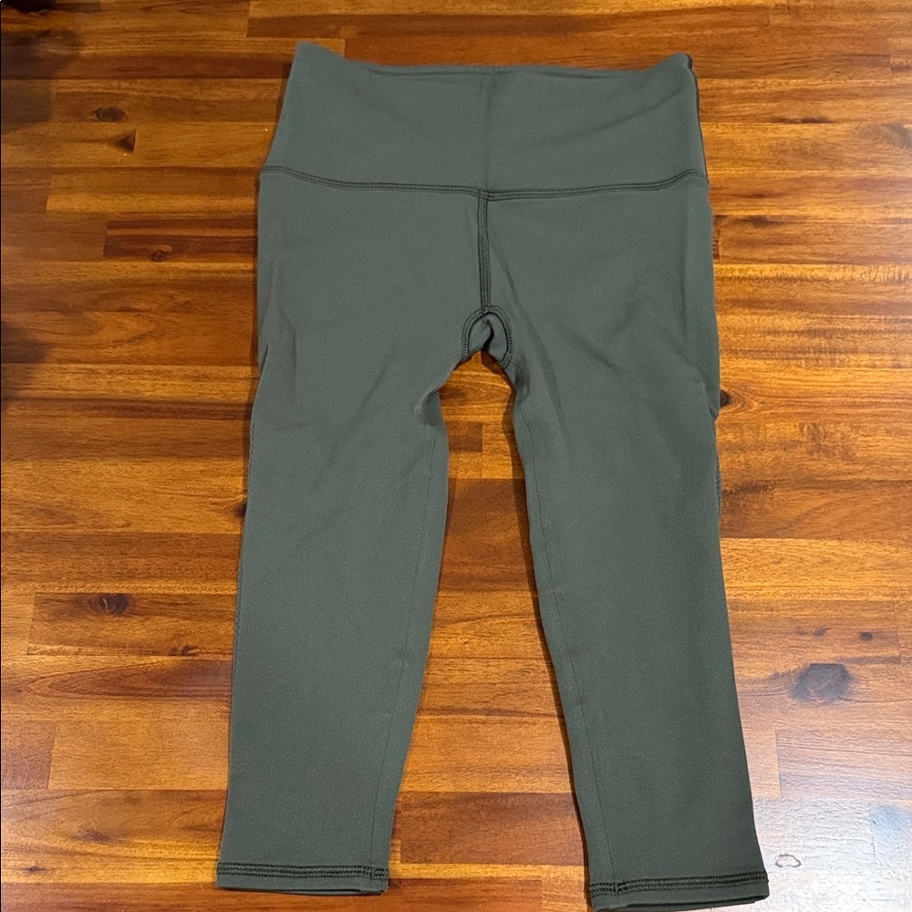 Lululemon Olive Green Knee-Length Leggings with Mesh Accents on the Sides